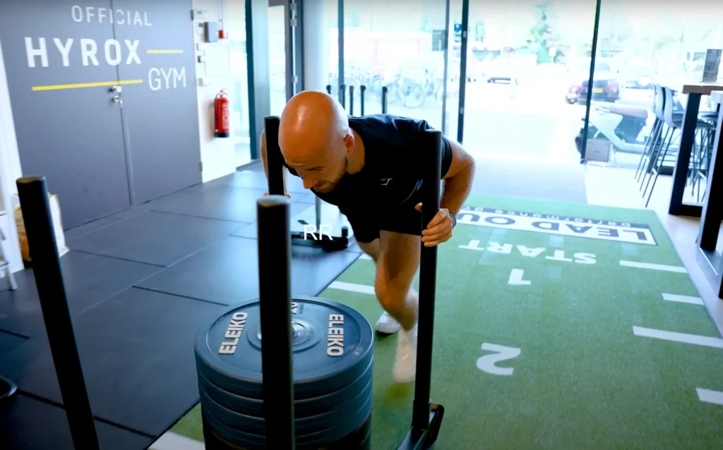 slee push 1e hyrox oefening